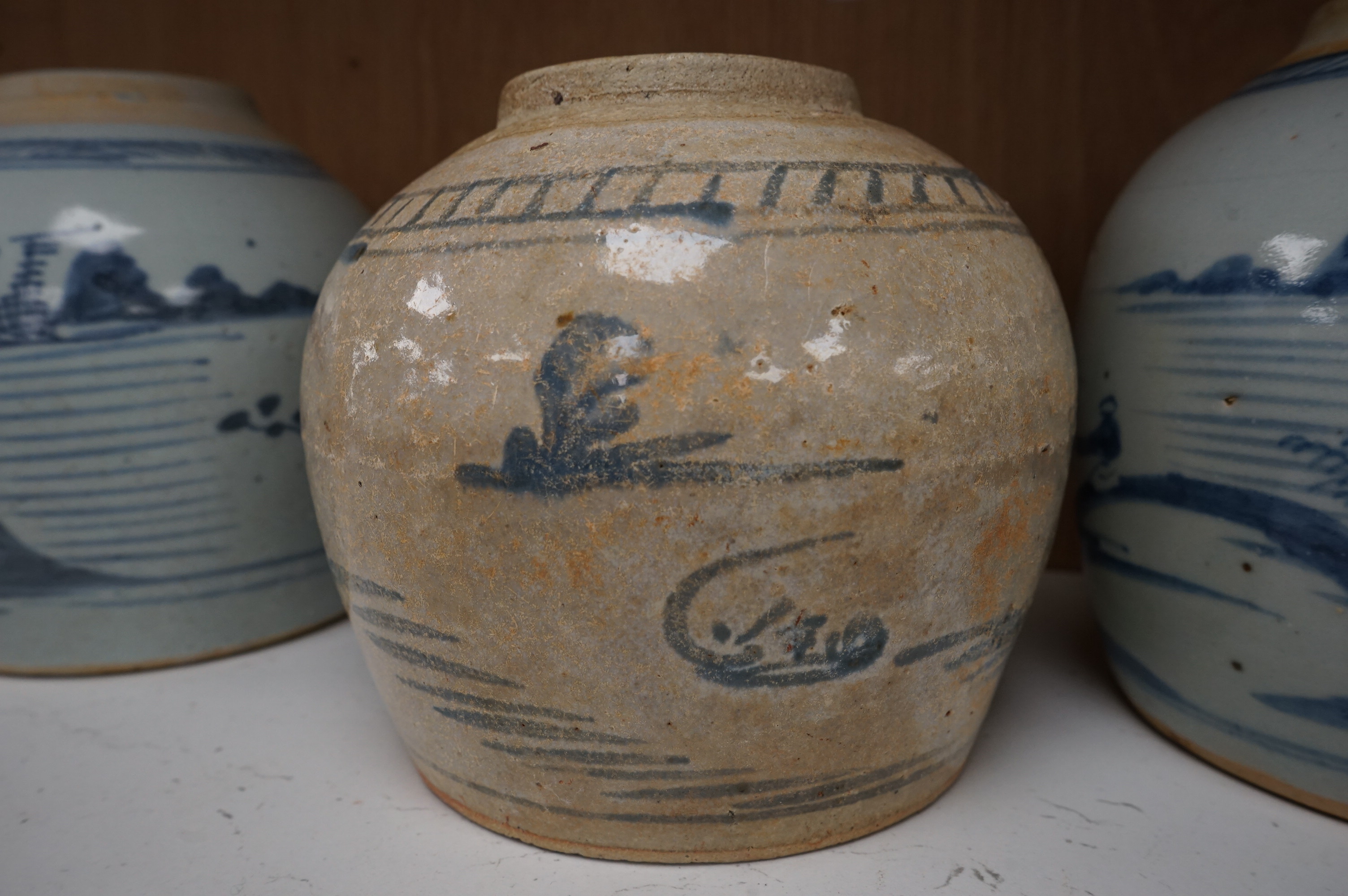 Three 18th/19th century Chinese blue and white jars, tallest 16.5cm high. Condition - fair